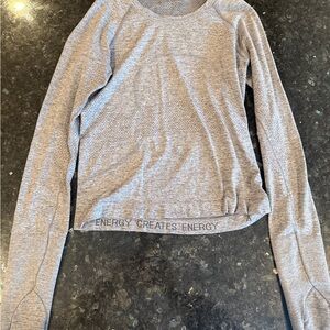 Lulu ENERGY Creates Energy Women's Grey Long-Sleeve fitness top with thumb holes